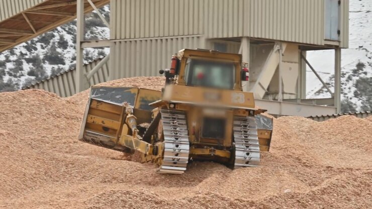 Sawdust and Steel: Efficient Cleanup by Bulldozer