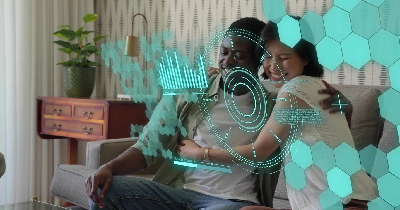 couple getting pencil, completing finance form and celebrating under holographic charts above table