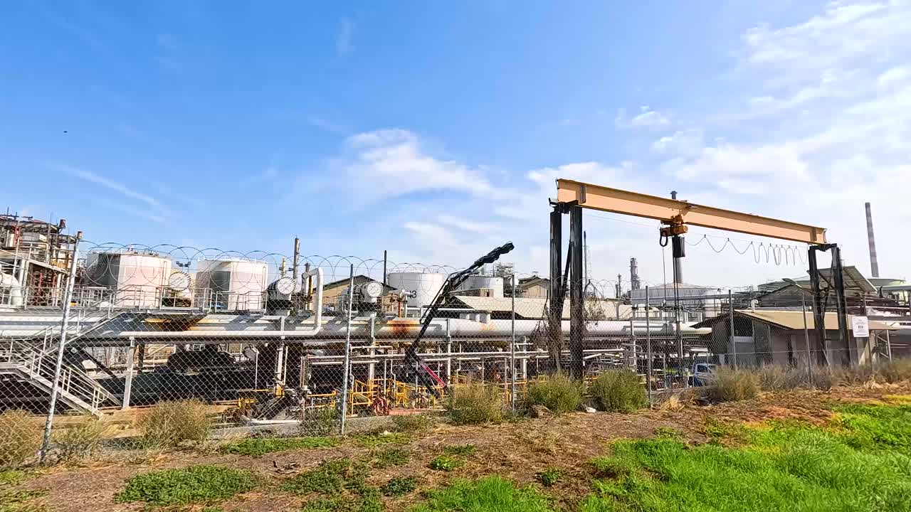 A series of frames showing an industrial facility in Geelong, Australia, with clear skies and bright lighting