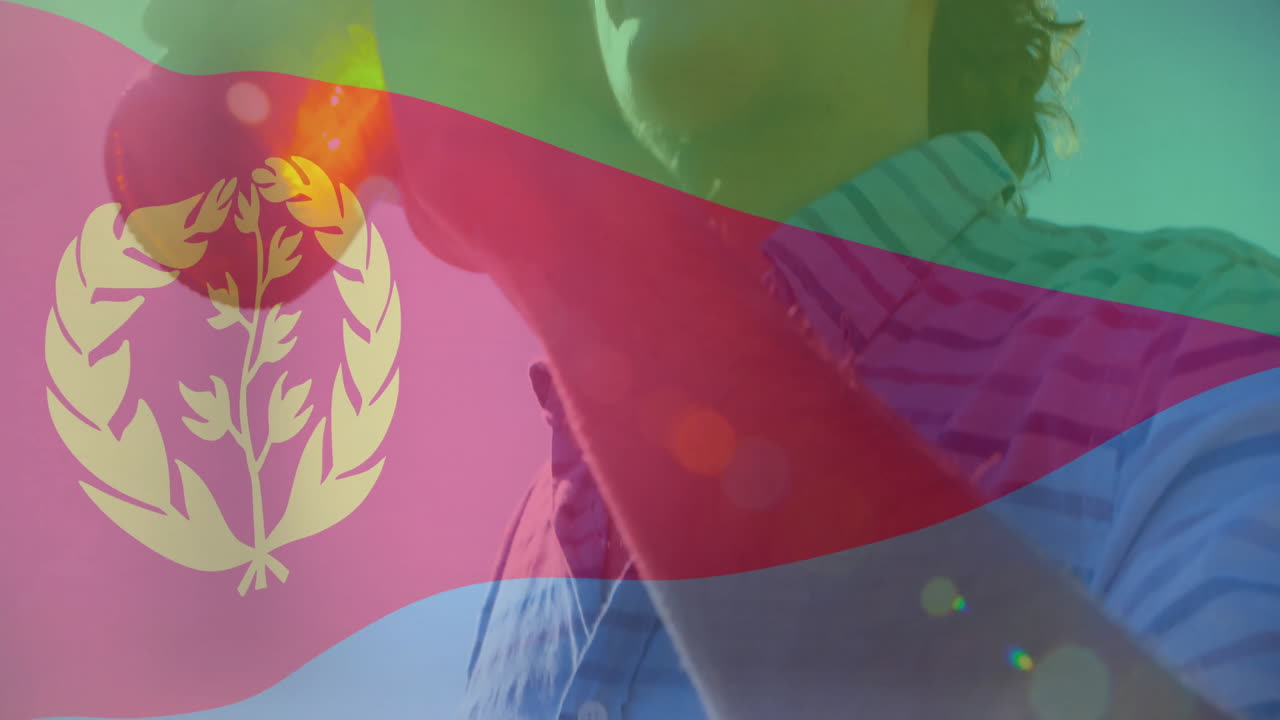 Drinking from bottle, person with animation of Eritrean flag colors and emblem