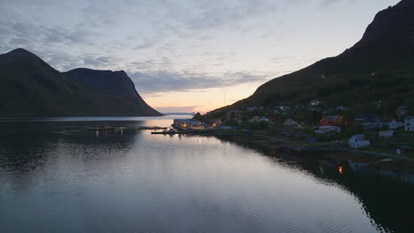 cinematic aerial footage of the arctic sunset in torsken, norway, europe