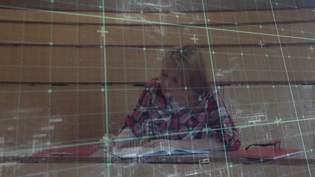 Female student opening textbook and writing with digital grid overlay, raising hand to ask question