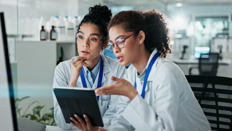 Scientists collaborating in a lab