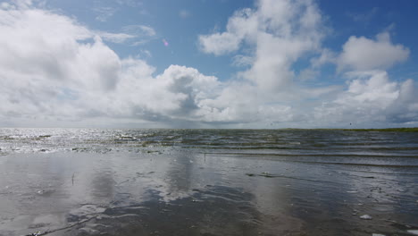 wide shot of the calm north sea near sankt peter ording