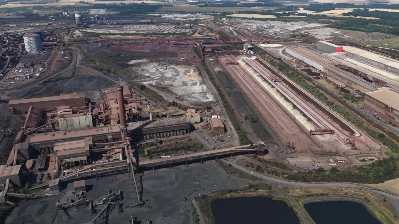 Aerial view of Scunthorpe Steelworks in North Lincolnshire, showing blast furnaces, heavy industry and large-scale primary steel production.
