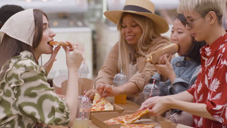 friends eating in the park