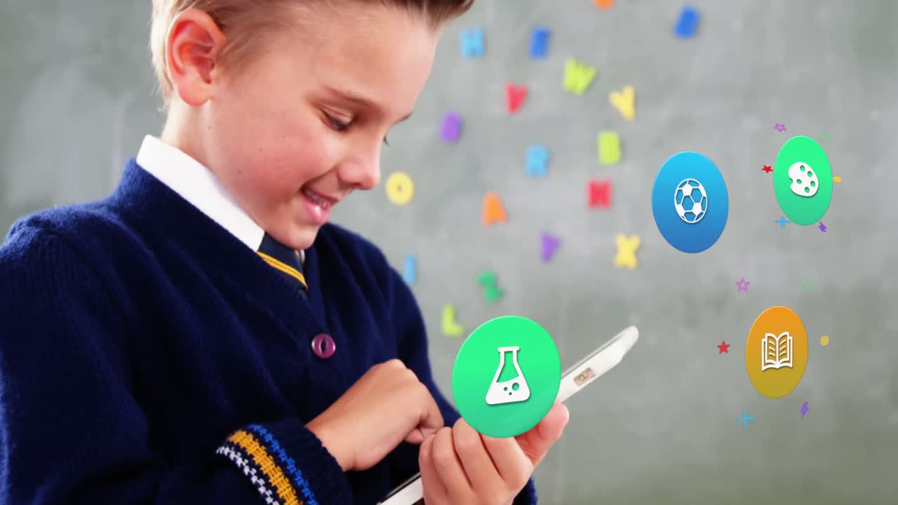 animación de iconos coloridos sobre un escolar caucásico usando una tableta