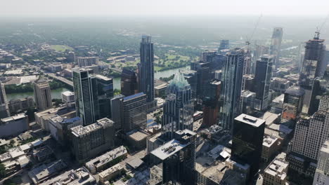 aerial view of a city skyline with skyscrapers and river