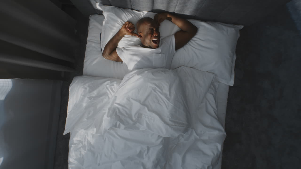 Man sleeping in bed