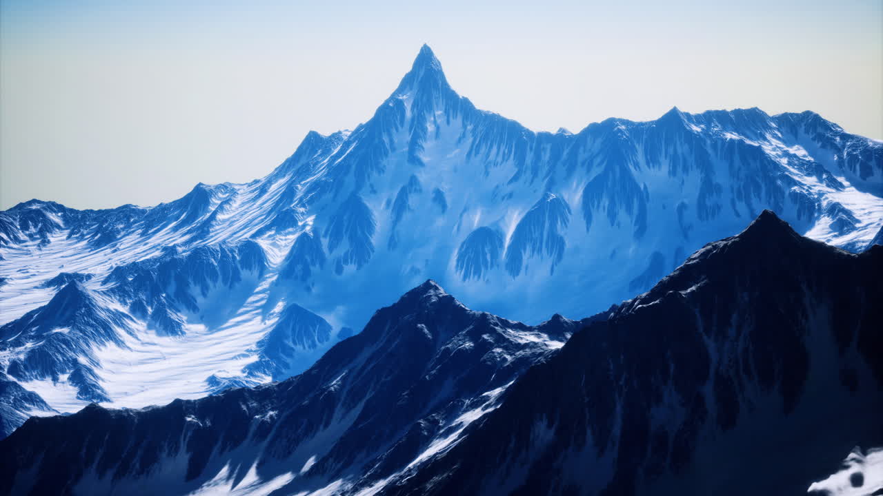 Majestic peaks tower over serene valleys in breathtaking mountain landscape