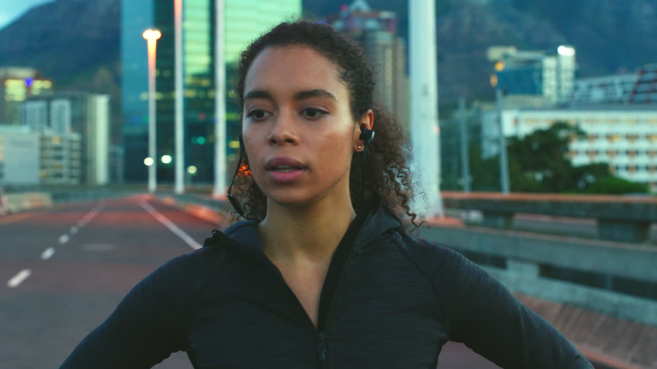 Running, tired and woman in city at night stop to