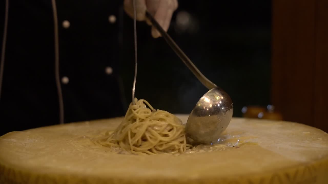 A Chief cooks food on a grill, close up shot, insert shot