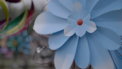 blue paper pinwheel turning in the breeze.