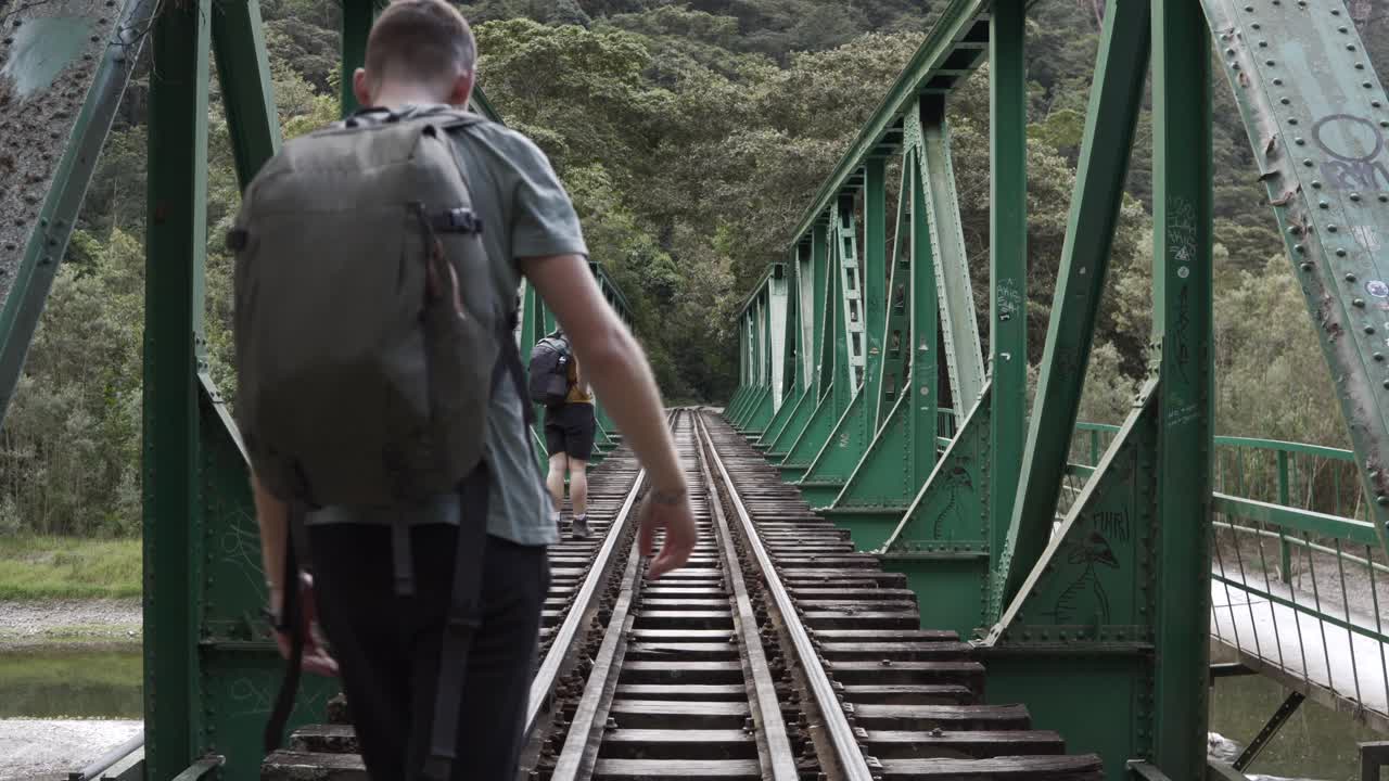Train tracks path to Machu Picchu Peru landmark tourist attraction destination journey