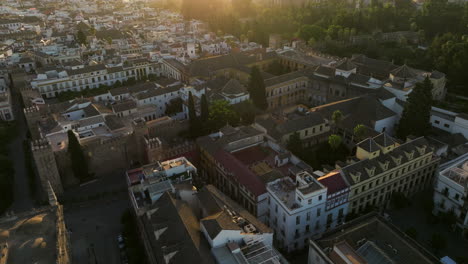 Aerial-Of-Royal-Alcázar-of-Seville-And-The-Architectural-Cityscape-In-Seville,-Spain