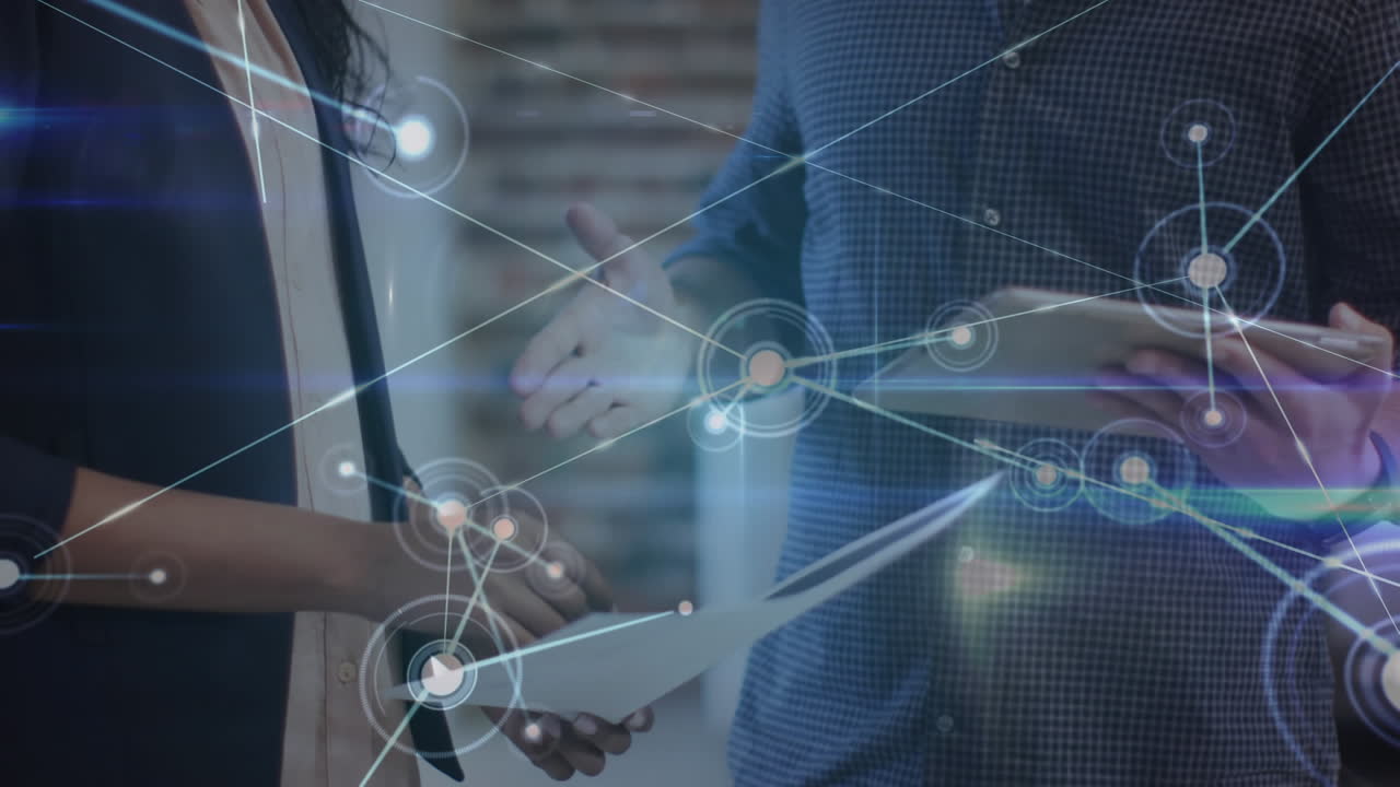Diverse office colleagues shaking hands, symbolizing global networking in business.