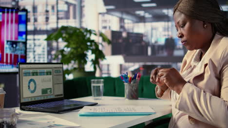 businesswoman reviewing documents in the office