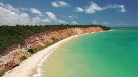 Beach-drone-video-of-broken-car-in-Alagoas,-Brazil