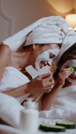 mother and daughter enjoying a relaxing face mask spa day