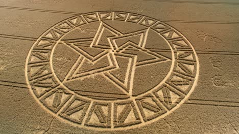 West-Meon-golden-barley-meadow-farmland-strange-crop-circle-aerial-view-orbit-left