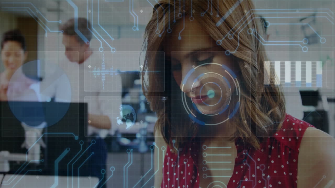 In tech-focused office, woman in red top with digital circuit animation overlay