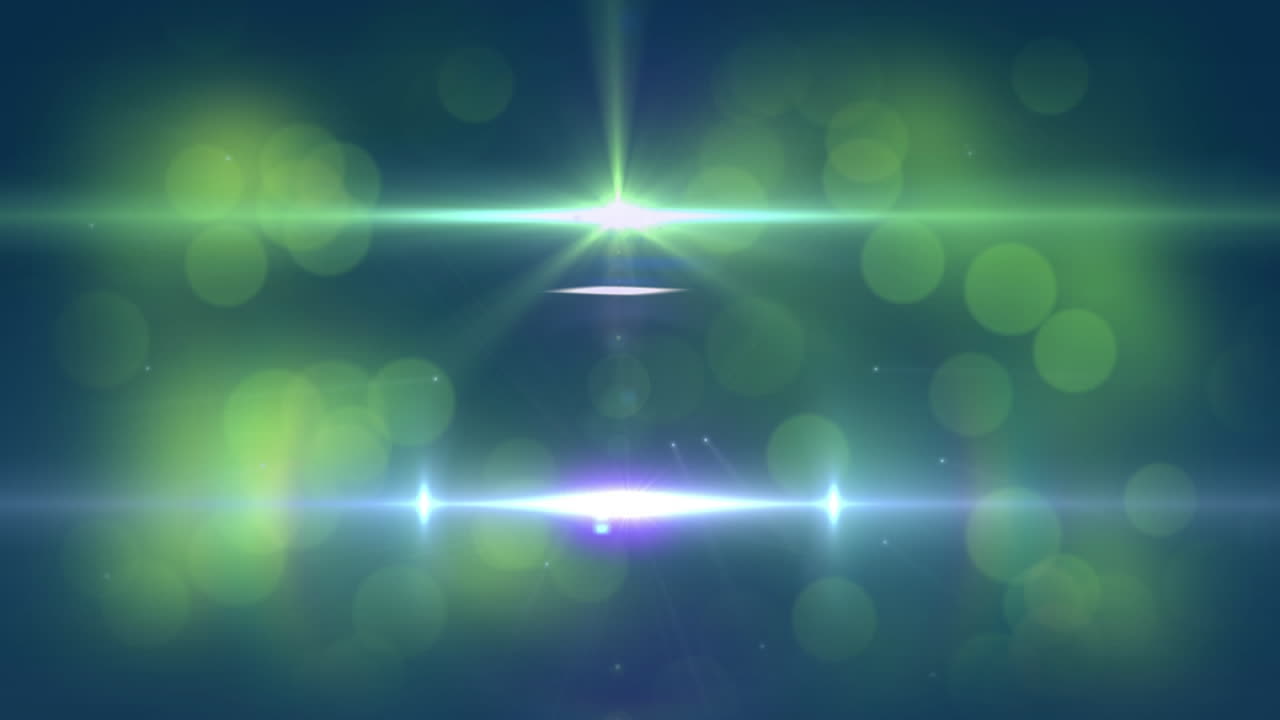 파란색 배경에 녹색 빛나는 불빛 반점