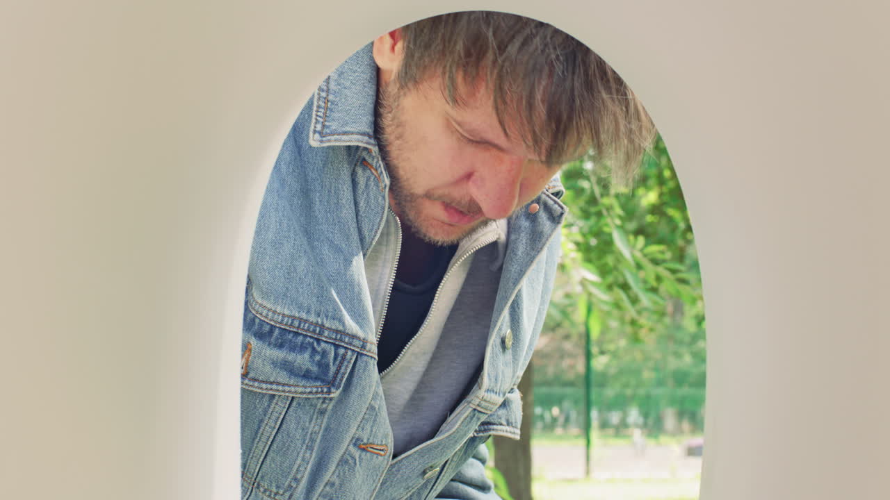 Man Collecting Envelopes from Mailbox Outdoors