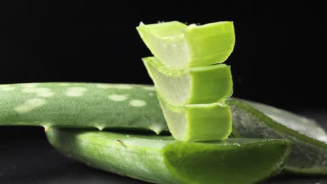 fresh aloe vera leaves, sliced for skincare treatment and home remedies