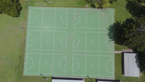 drone captures empty sports courts and surrounding area