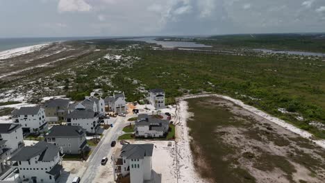 Amazing aerial shot of residential neighborhood under development in green zone, Panama City Beach, Florida, USA