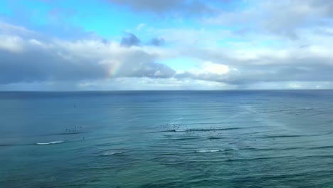 Beautiful-Rainbow-Forming-Above-Ocean-Horizon-In-Waikiki-Beach,-Hawaii