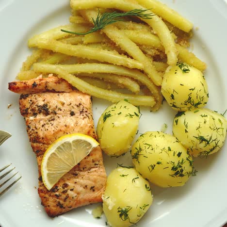 Fresh-and-tasty-baked-salmon-served-with-young-boiled-potatoes-and-yellow-bean