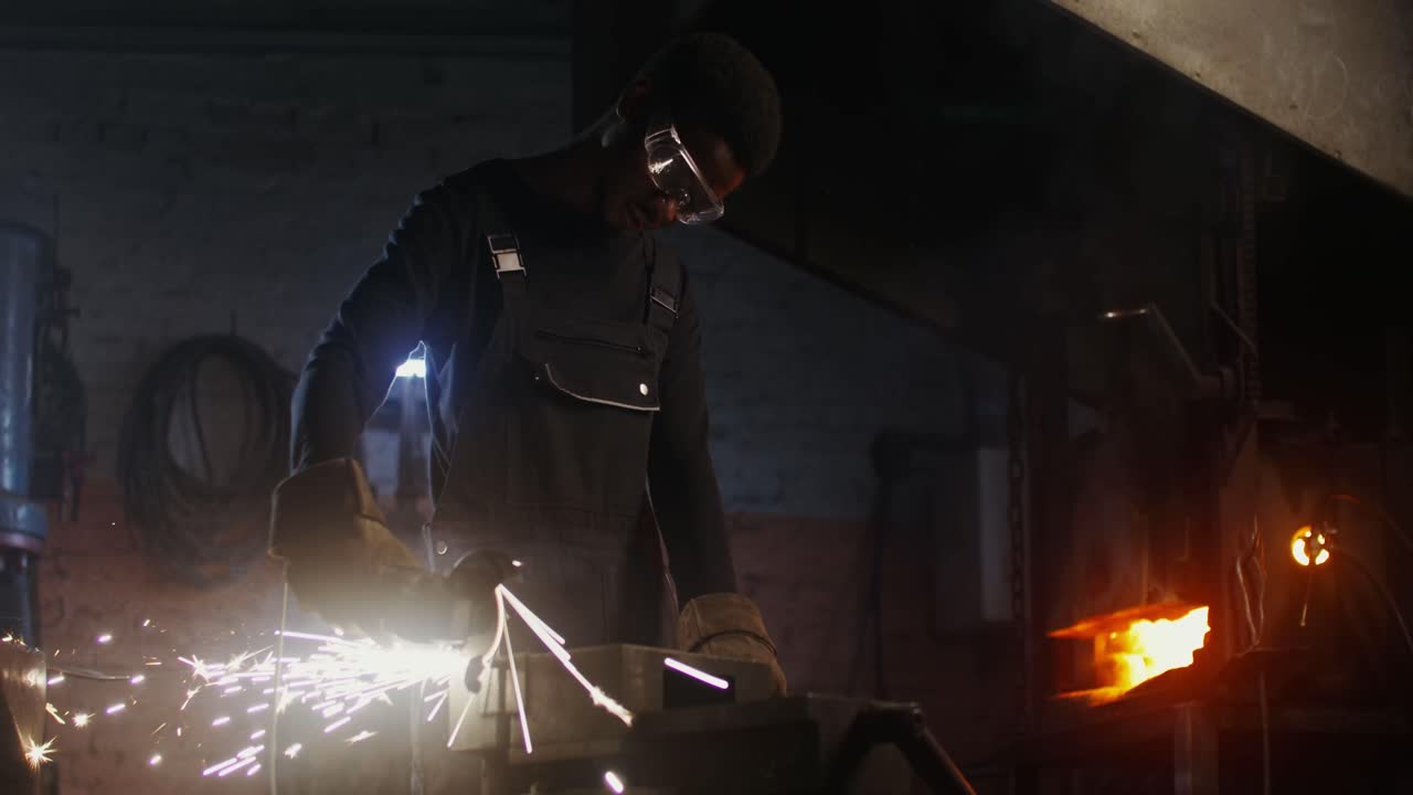 Metalworker Grinding Metal