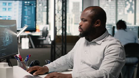 man working as ai developer in office