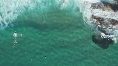 waves breaking on rocks