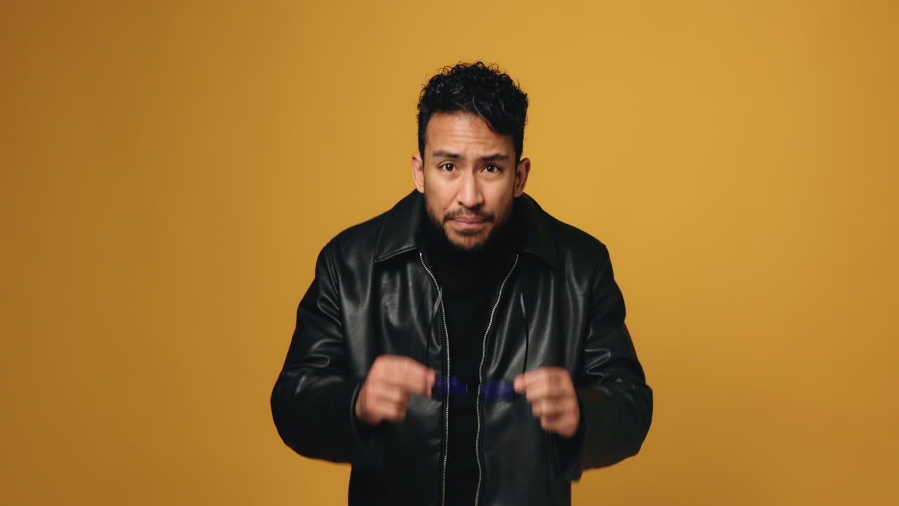 Portrait of a smiling man in a leather jacket