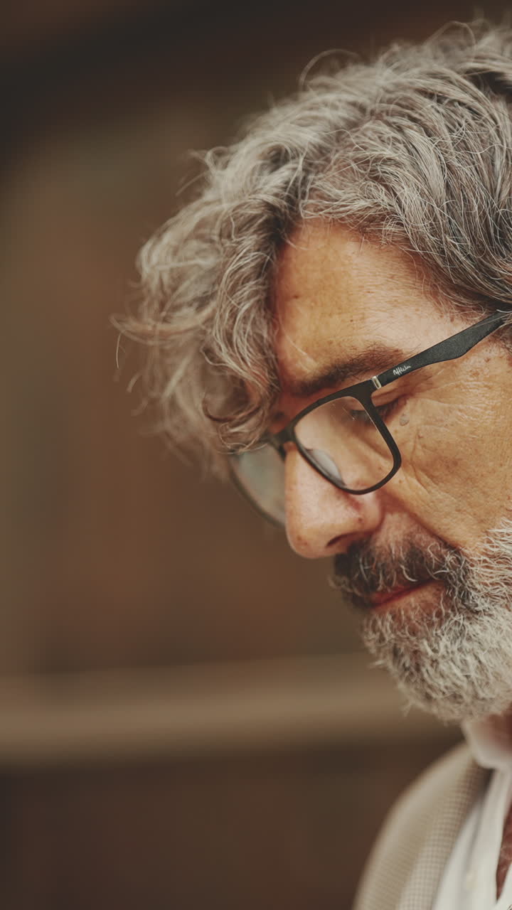 Portrait of a Mature Man with Glasses