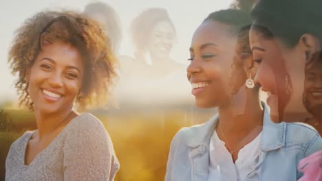 group of happy women friends posing outdoors