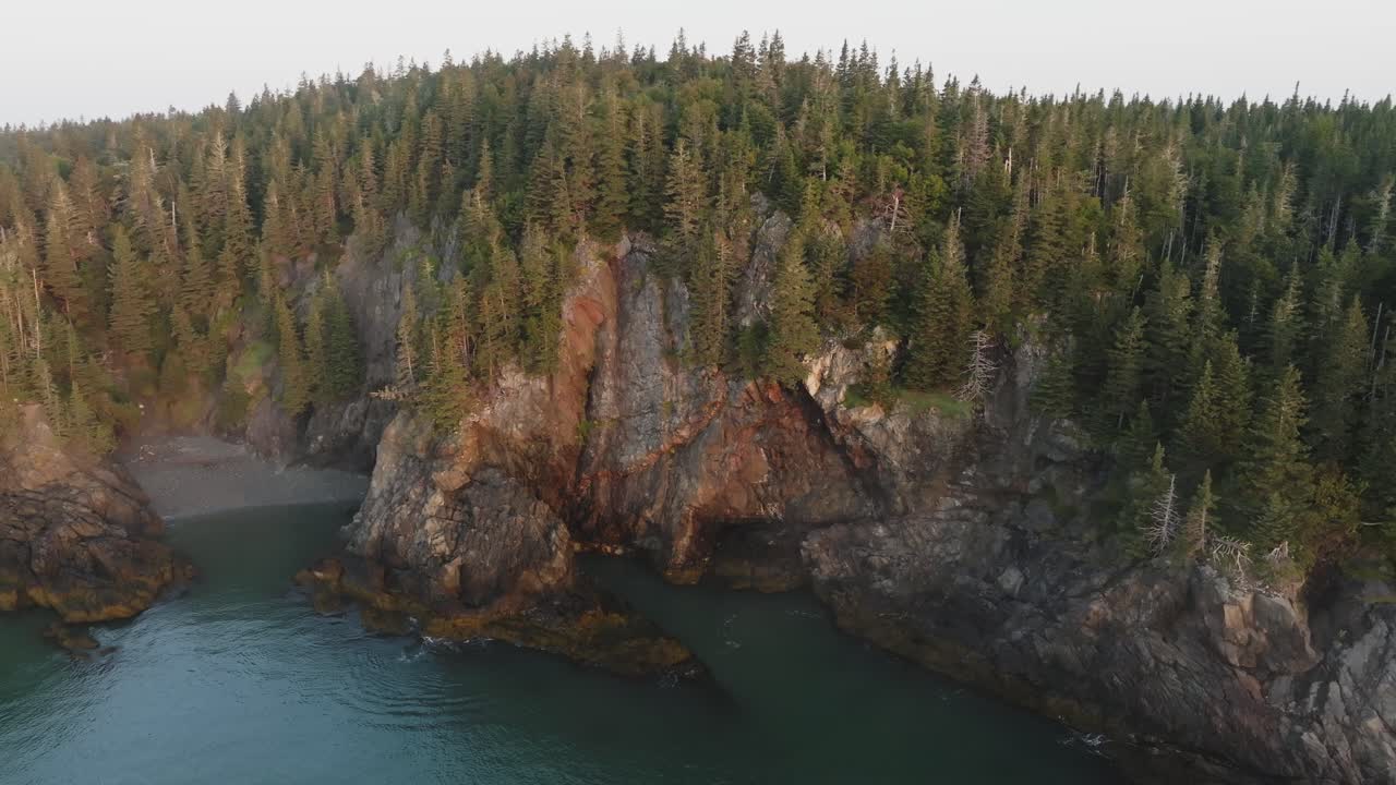 Breathtaking Orbit Around Maine's Bold Coast Cliffs Illuminated by Sunrise