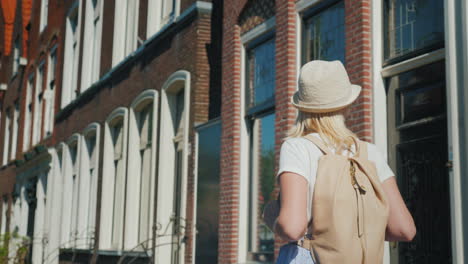 Young-Woman-Walks-Through-Delft