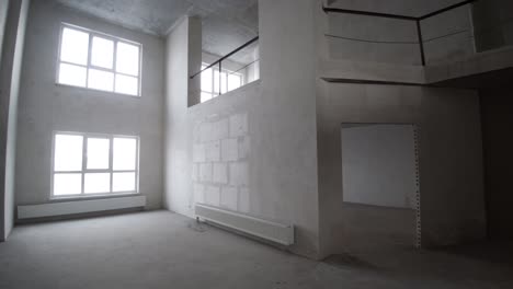 empty unfinished loft apartment under construction