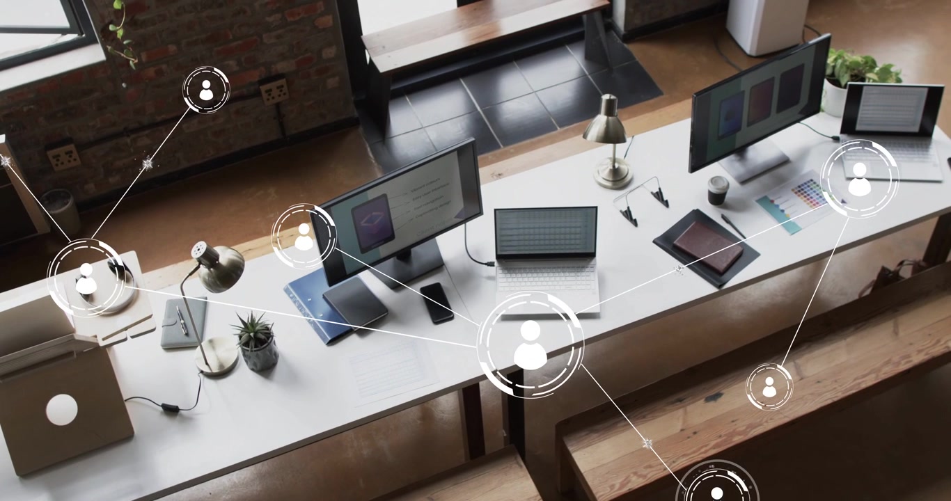Single user icon appearing over shared desk starting network, linking devices and showing teamwork