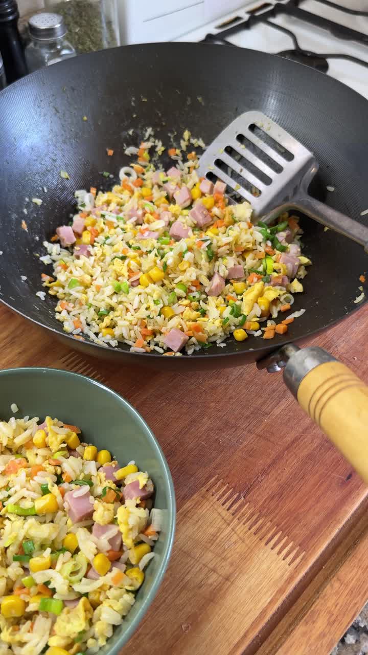Vertical View Of Chow Fan Rice Meal Cooked In A Wok Pan. High Angle Shot