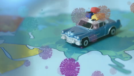 animación de células macro covid-19 flotando sobre un mapa del mundo con un juguete de coche de pie en asia