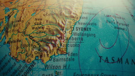 close-up of a world globe, focusing on australia
