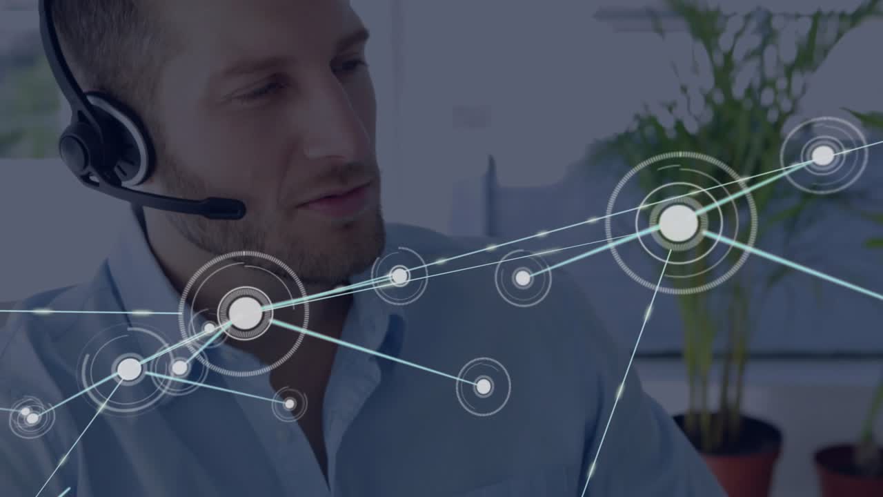 After typing man lifting headset and speaking while network graphics expanding for technology demo