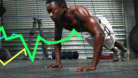 animation of graphs moving over african american fit man performing push up exercise at the gym