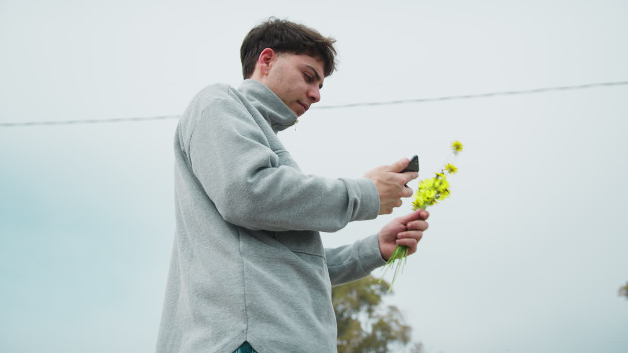 Man Doing A Picture Of The Flowers He Picked For Valentines Day
