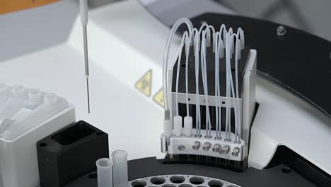 dilution pipette lifts up and the dilution cleansing mechanism goes down on chemistry analyser