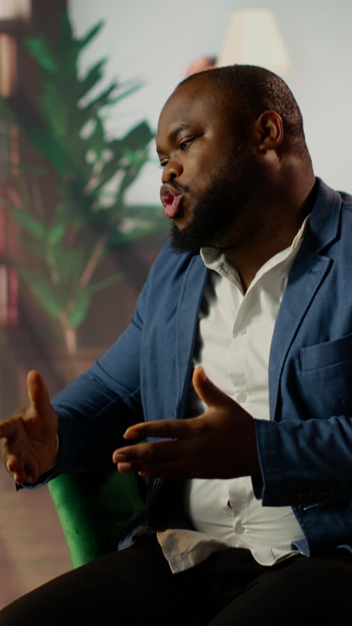 Confident African American Man Speaking and Gesturing During Discussion